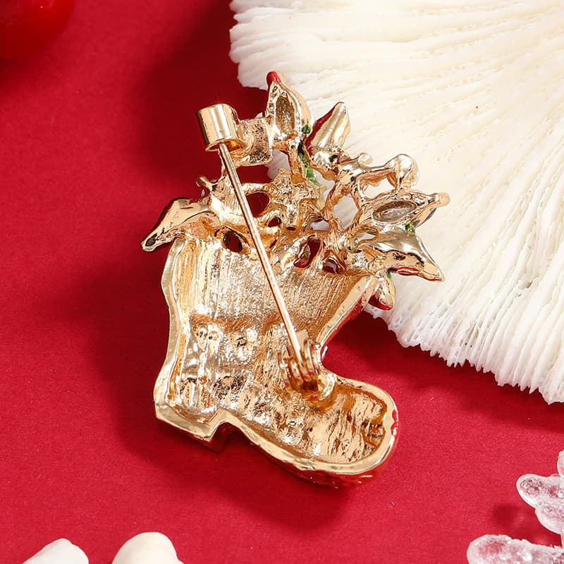 Broche navideño con incrustaciones de diamante de imitación