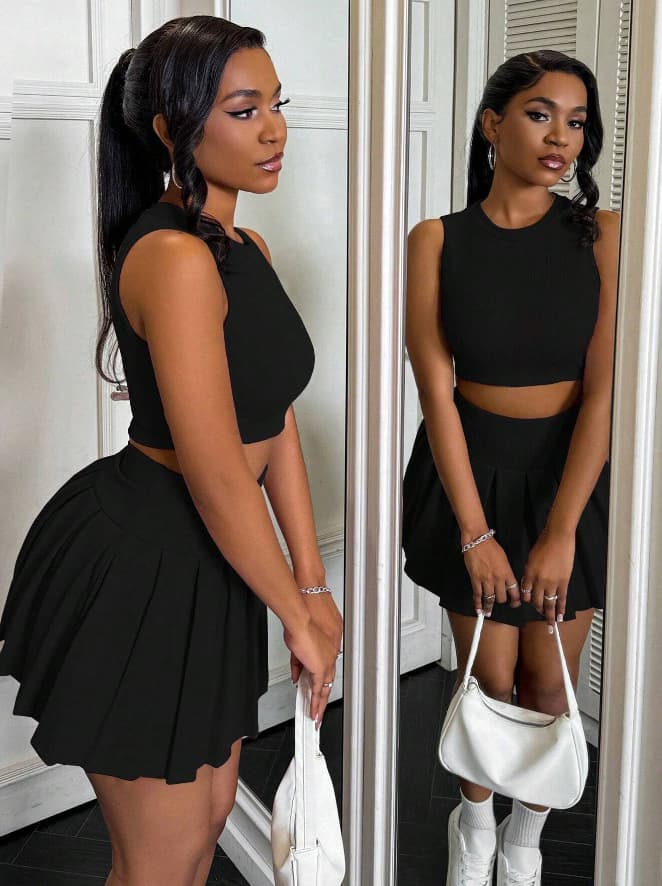 Traje con falda plisada sin mangas para mujer