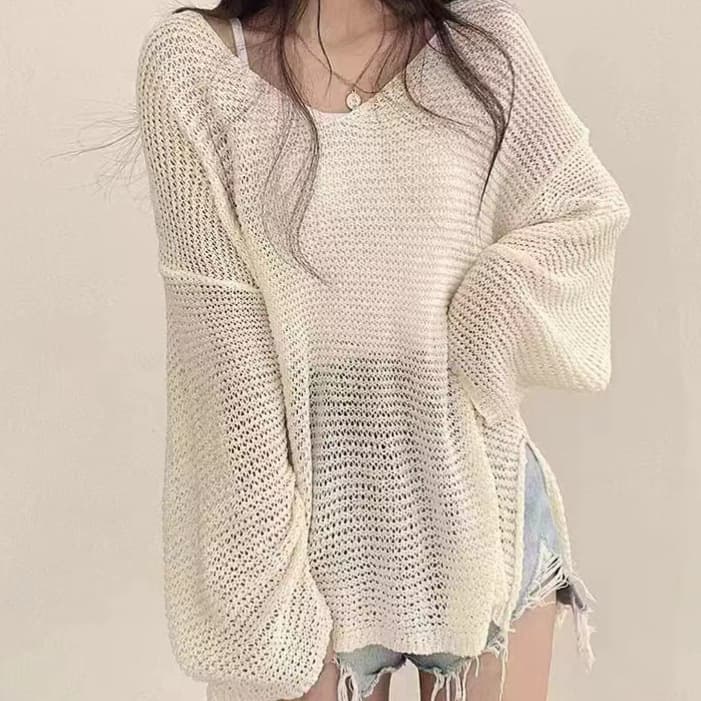 Suéter pullover manga larga fino holgado
