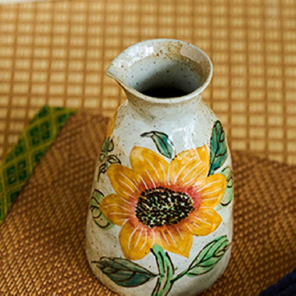 Dispensador de vino de cerámica con estampado de girasol