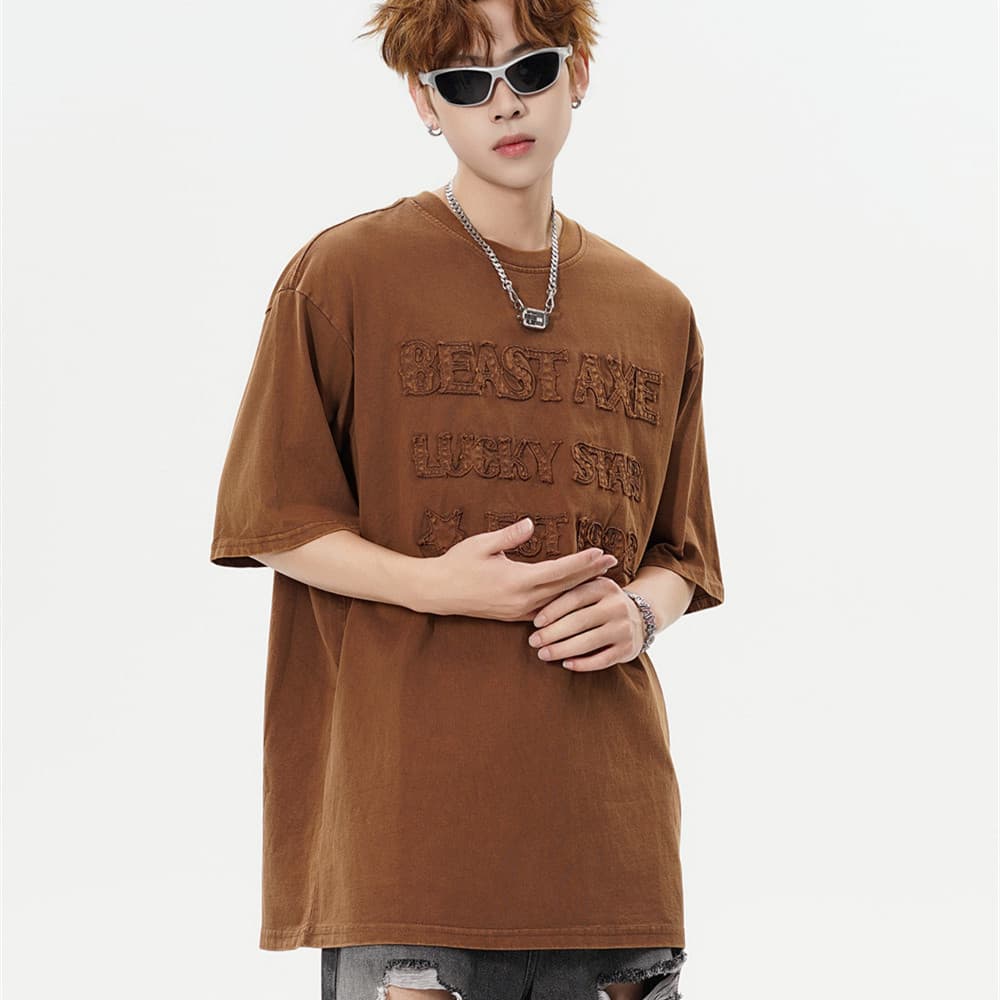Camiseta hombre suelta estilo streetwear desgastada