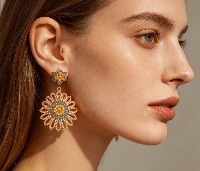 Aretes colgantes estrella y flor con circón