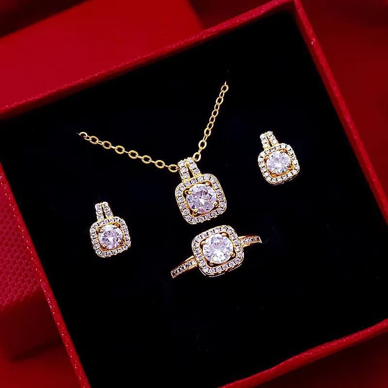 Conjunto de joyería elegante con collar, aretes y anillo