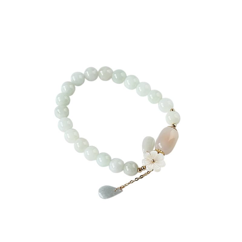 Pulsera de jade y nácar con diseño floral
