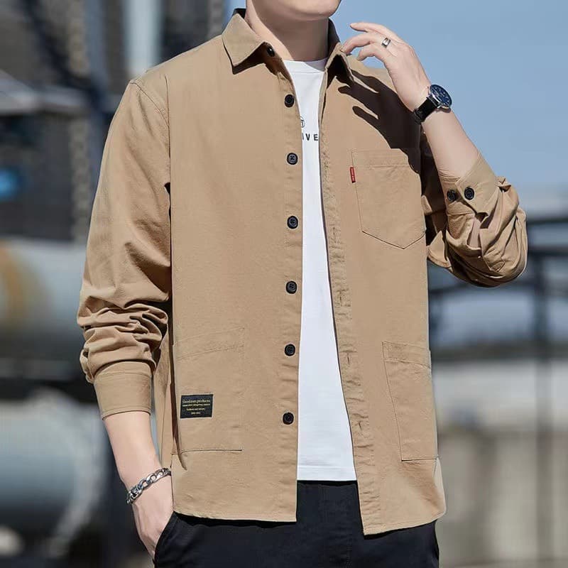 Camisa holgada de manga larga con bolsillos, corte casaca