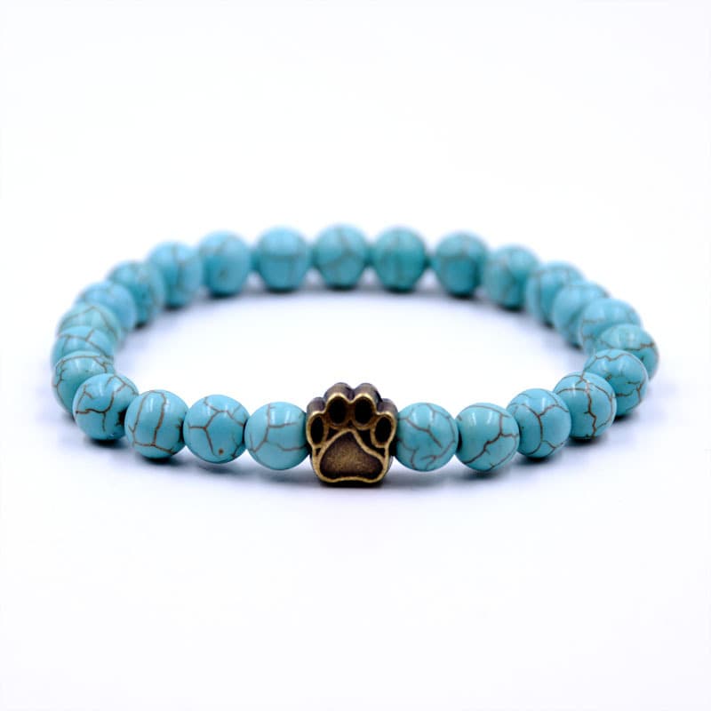 Pulsera de piedra volcánica con forma de pata de perro