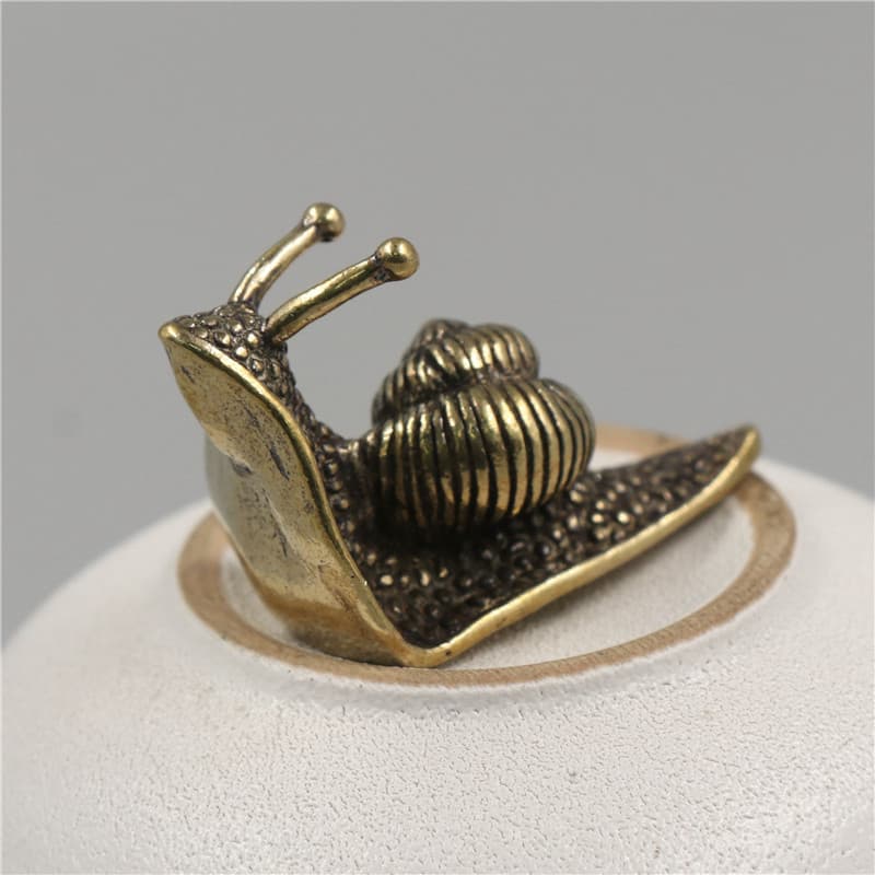 Mascota de té caracol de cobre macizo para decoración