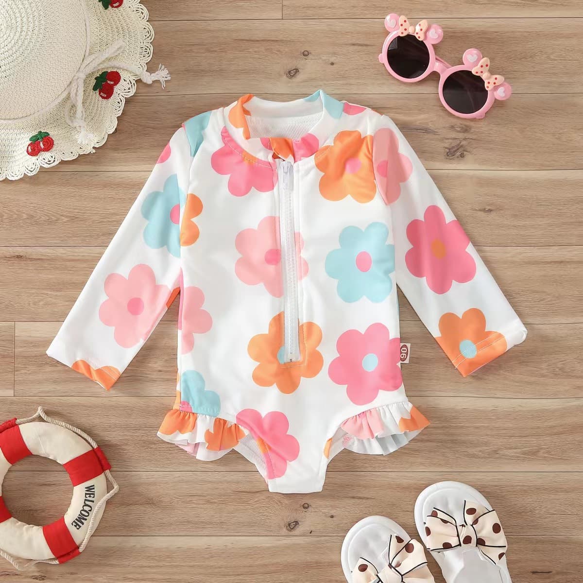 Bikini tipo romper con estampado floral para niña