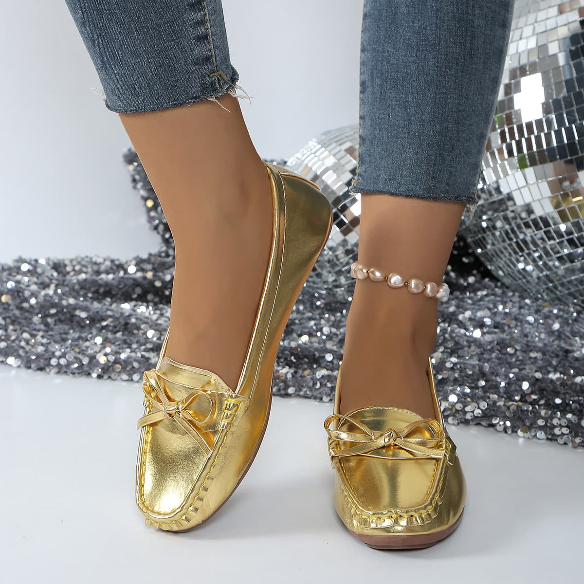 Zapatos slip-on planos para mujer con moño y suela suave