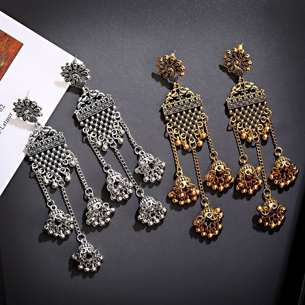 Aretes largos étnicos con campanas huecas estilo bohemio