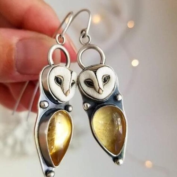 Aretes retro de búho con efecto ojo de gato