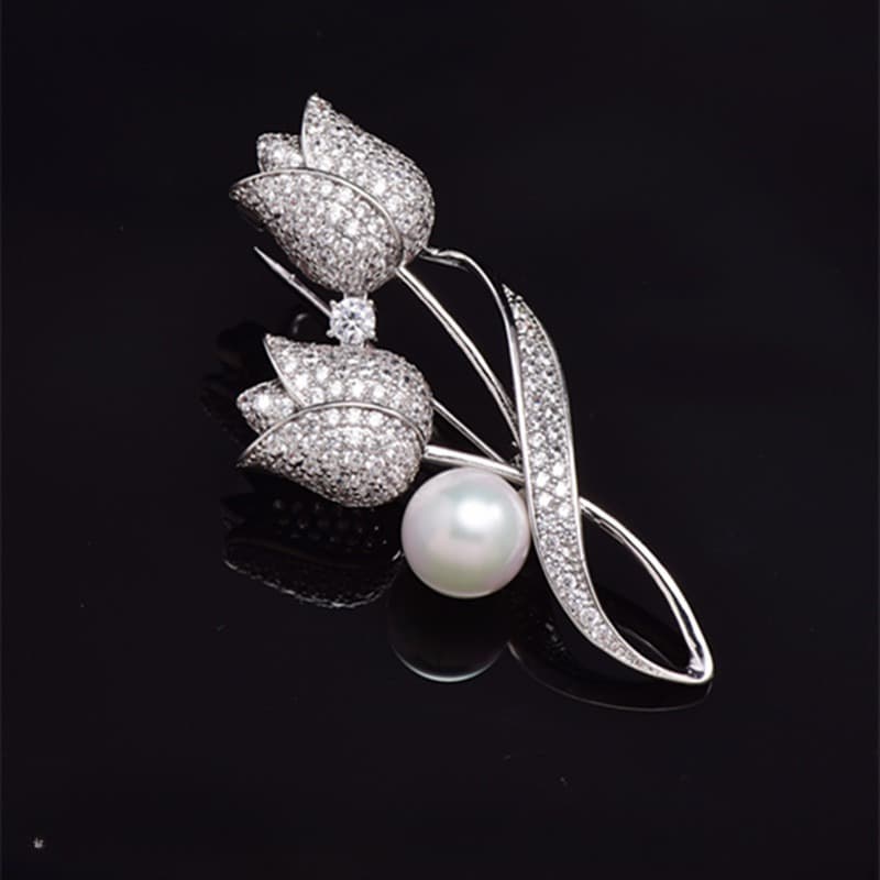 Broche tulipán con circonita incrustada