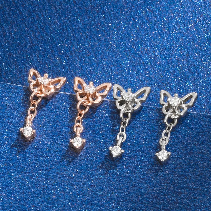 Aretes de plata esterlina con moño y circonias