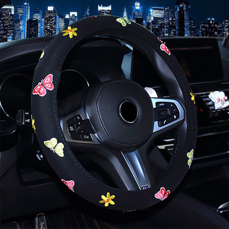 Funda de volante con bordado mariposa y flor