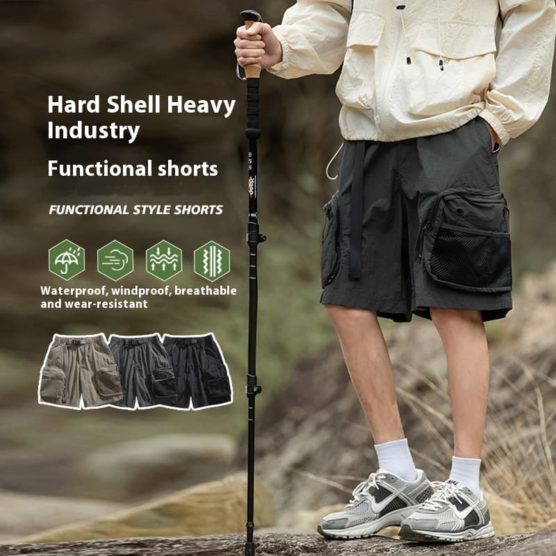 Shorts deportivos impermeables con múltiples bolsillos