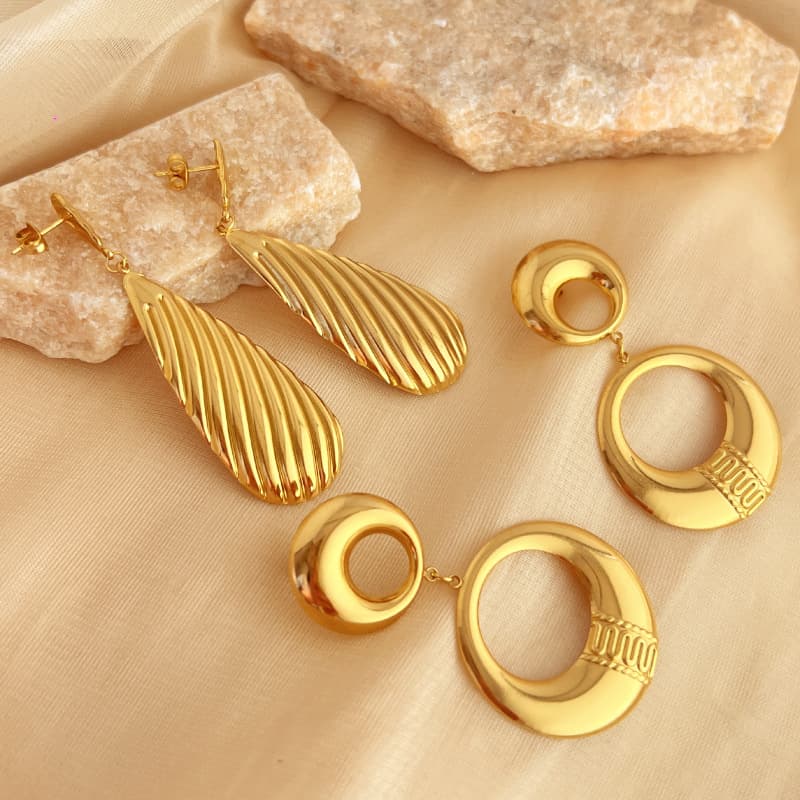 Aretes de acero inoxidable geométricos retro