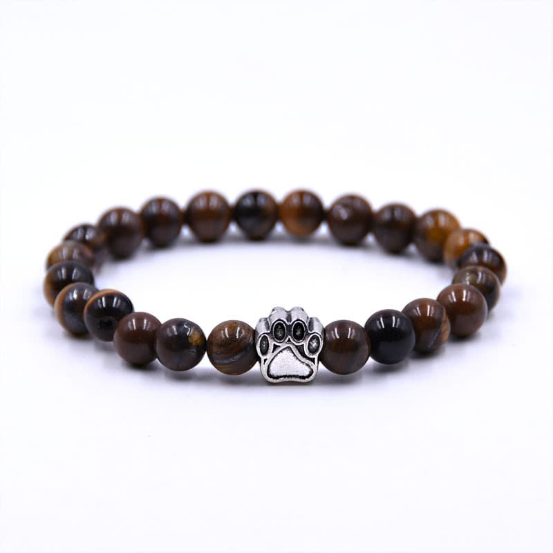 Pulsera de piedra volcánica con forma de pata de perro