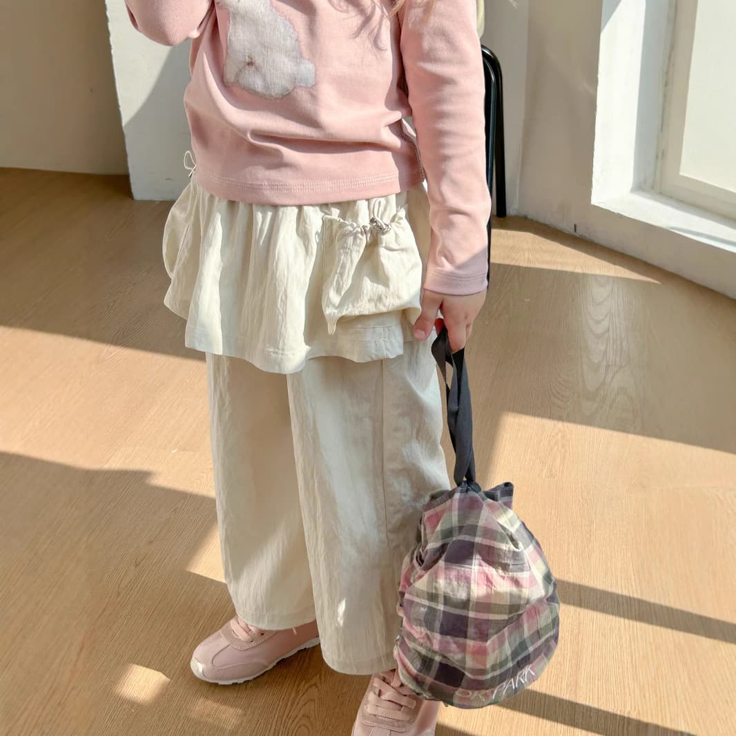 Pantalones casuales holgados para niña con detalle