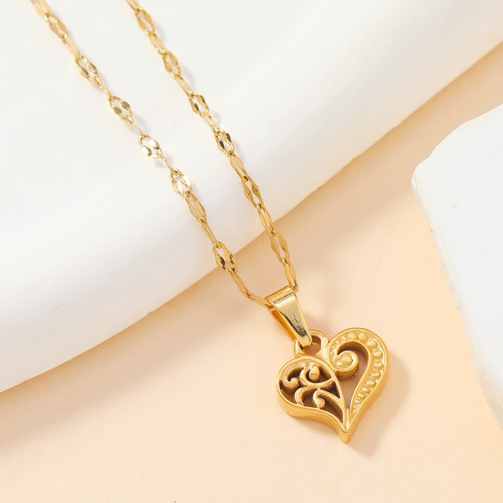 Dije de acero inoxidable con forma de corazón