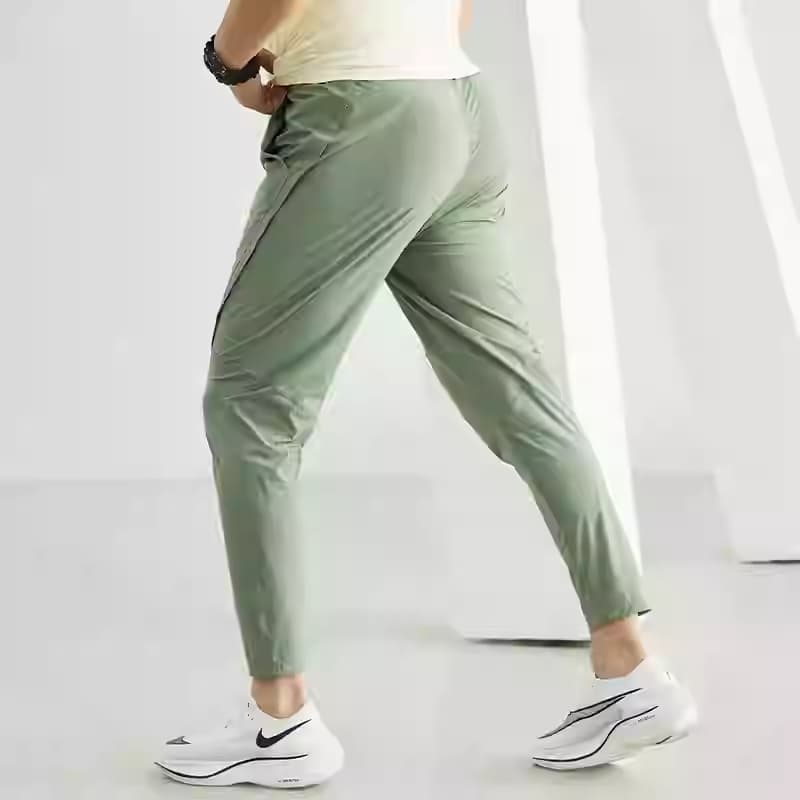 Pantalones deportivos elásticos de secado rápido