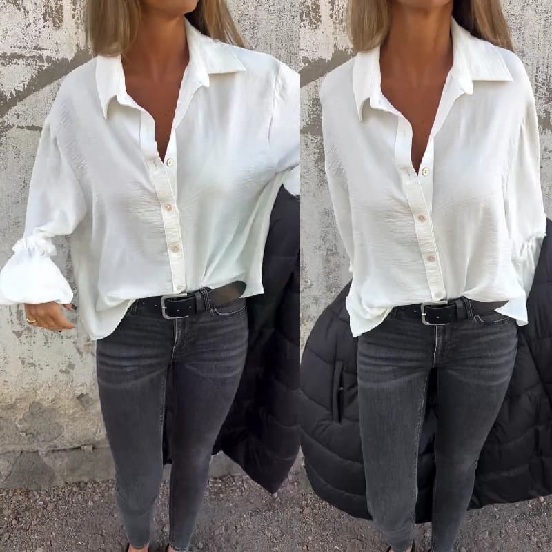 Blusa blanca clásica con botones y mangas globo
