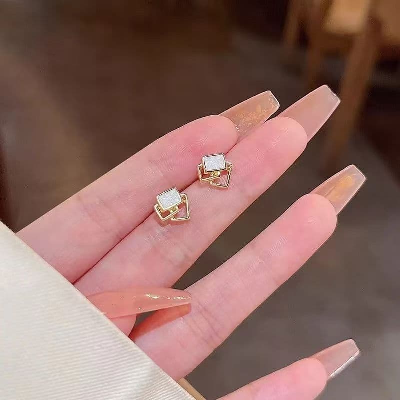Aretes de plata geométricos minimalistas para uso diario