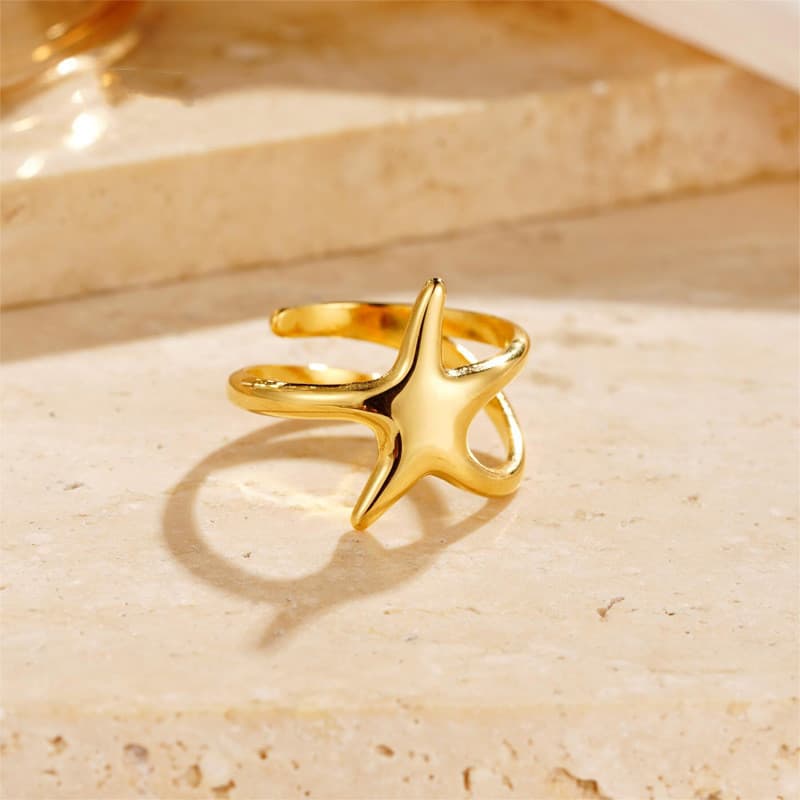 Anillo ajustable de estrella dorada