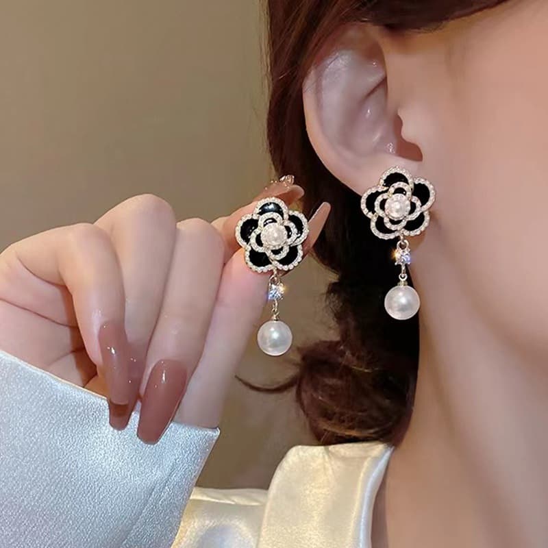 Aretes de perla vintage con diseño elegante