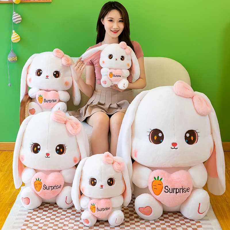 Peluche conejo orejas largas con zanahoria